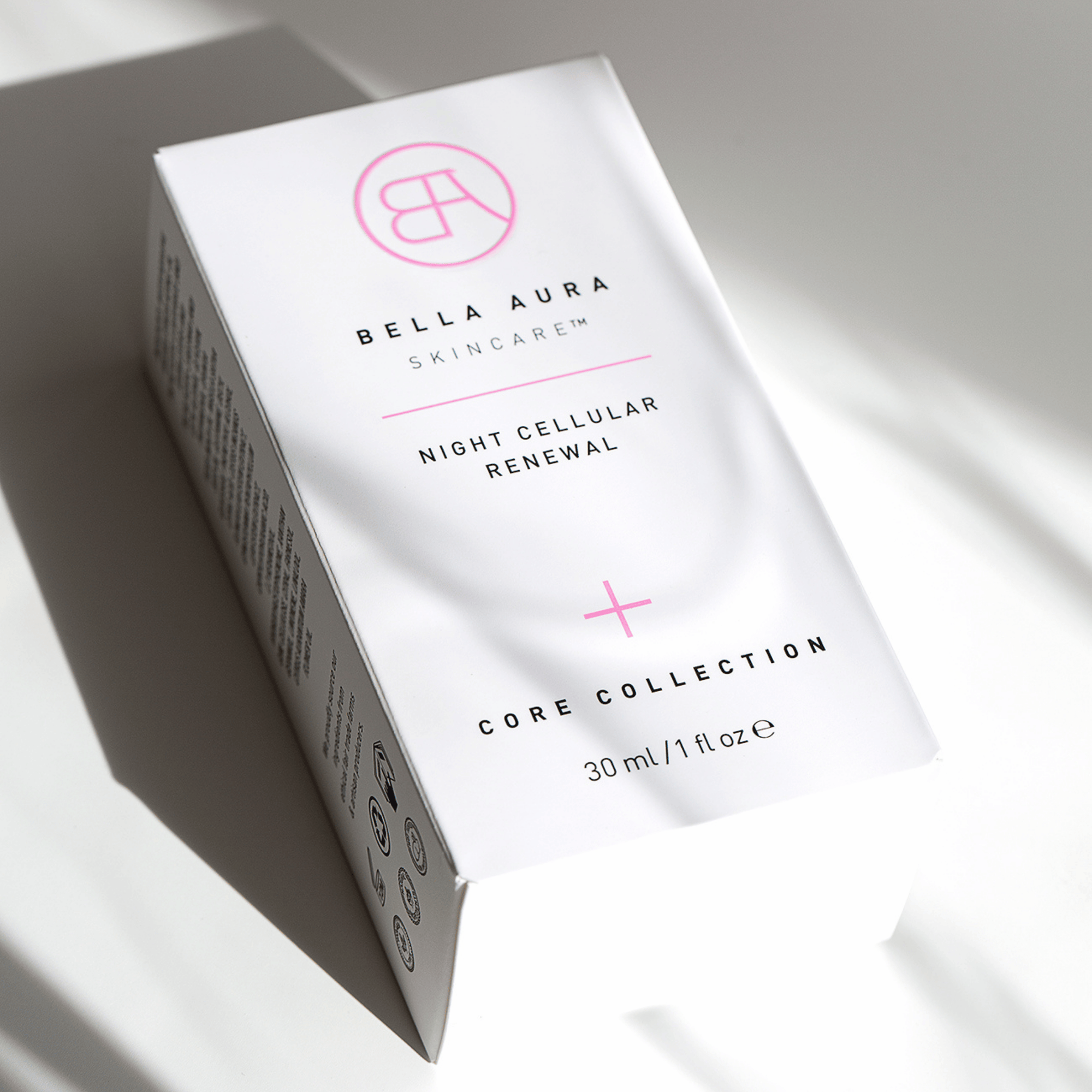 Bella Aura skincare night cellular renewal product packaging on a light background