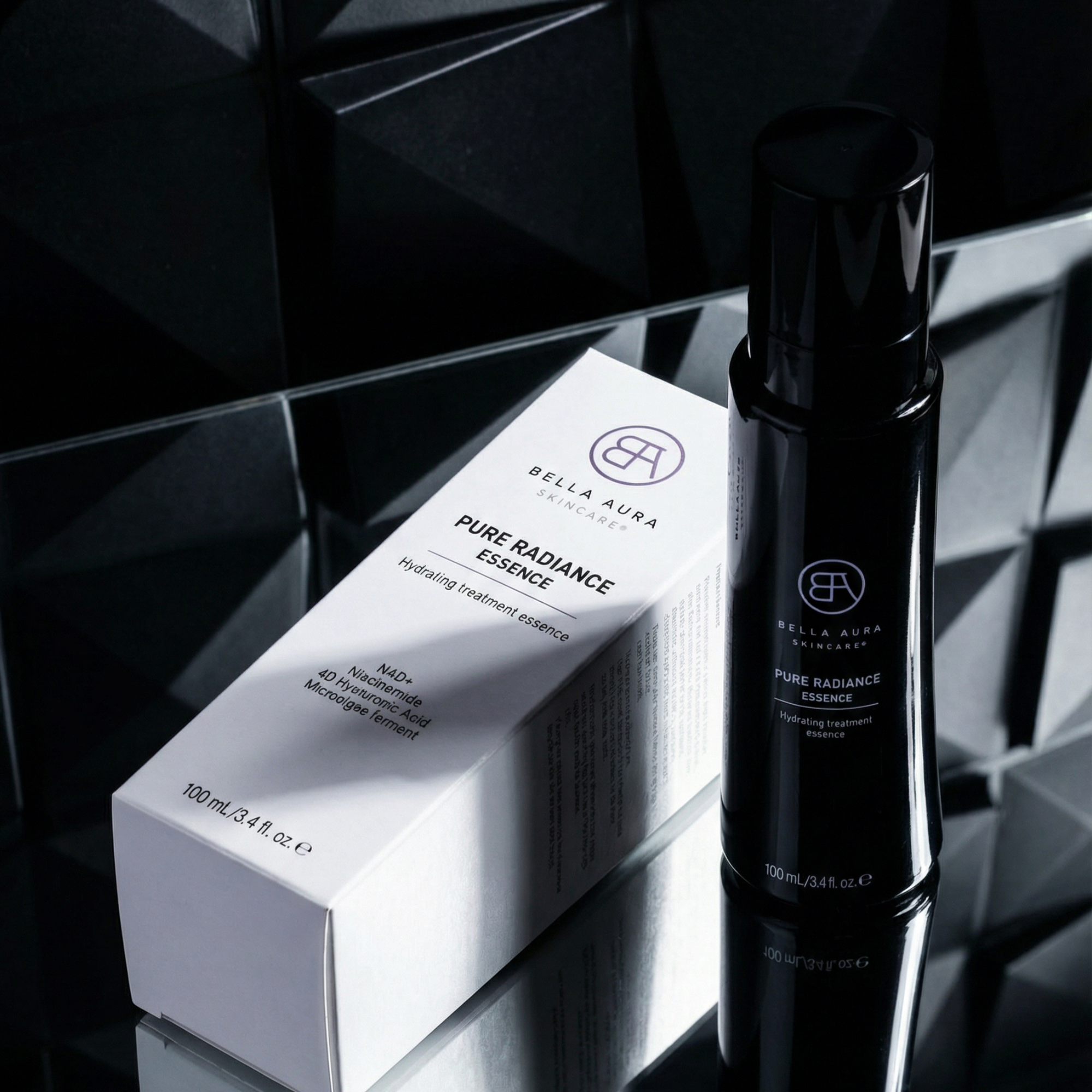 Black and white Bella Aura skincare product on a reflective surface with geometric background